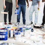 Remarkable People team action with social impact house renovation and painting